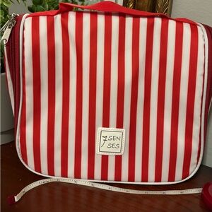 NWOT red and white striped hanging travel bag for cosmetics bathroom items